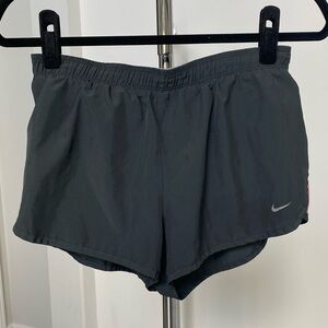 Nike dri fit size dark grey and pink running shorts Small